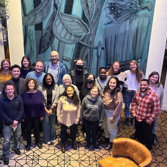 The SJN team poses for a photo during a 2025 team retreat in Seattle.