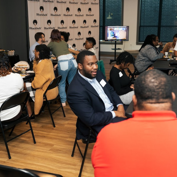 Participants discuss at tables