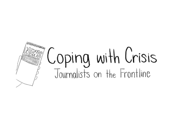 A person holds up a reporter's notebook