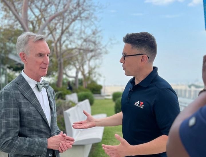 A reporter speaks with Bill Nye the Science Guy